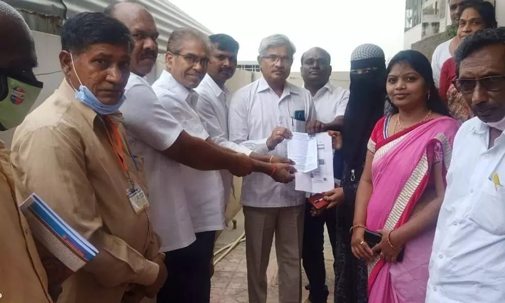 Tahsildar Lakshminarayana launching voter enrolment drive at 7th ward of Badepally municipality in Jadcheral on Thursday