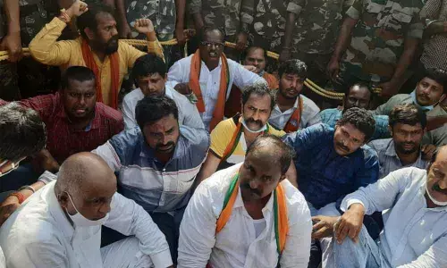 BJP State chief Somu Veerraju staging a dharna at Nellimarla on Thursday