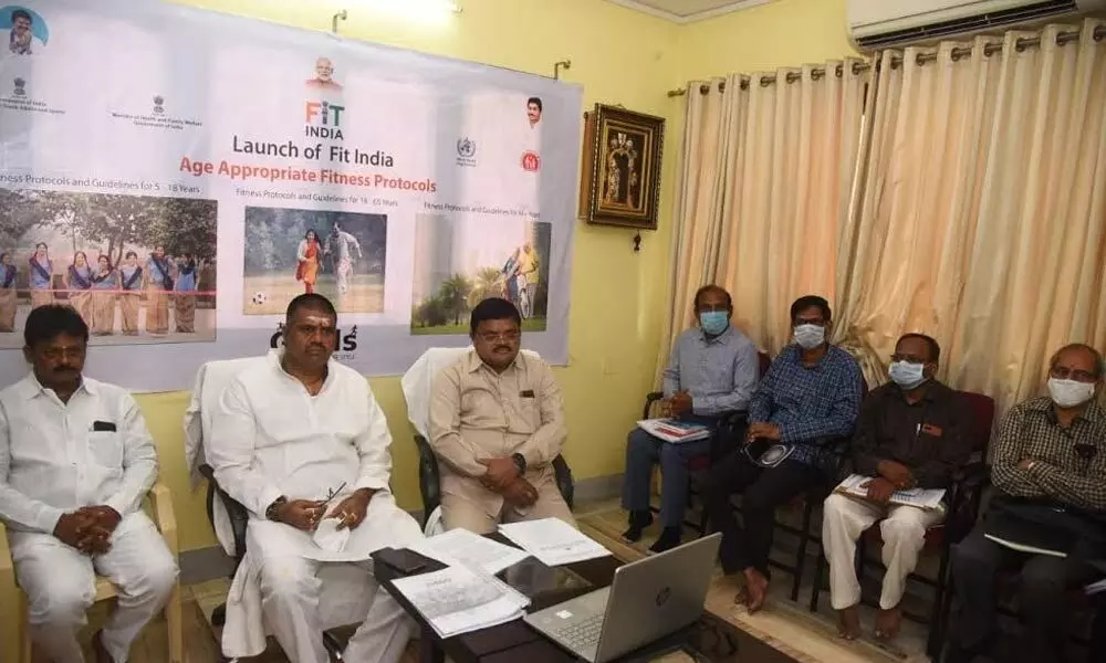 Tourism Minister M Srinivasa Rao taking part in a virtual conference in Visakhapatnam on Friday