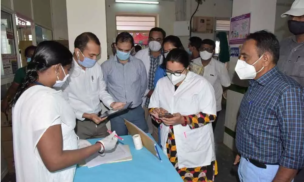Nalgonda District Collector Prashanth Jeevan Patil along with other officials during the Covid vaccine dry run programme held at PHC centre in Pangal of Nalgonda on Friday
