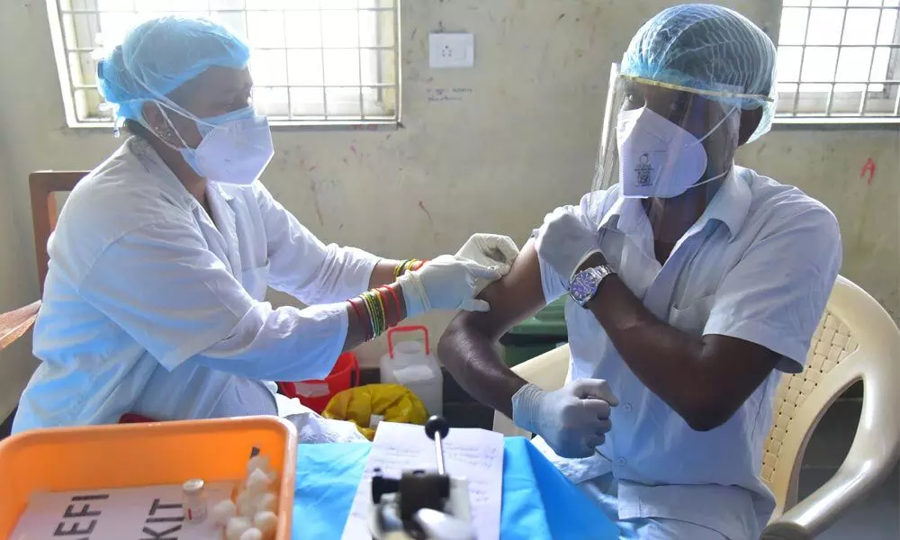 A health worker takes part in a dry run as part of preparedness for the administration of Covid-19 vaccine at Gandhi Hospital on Friday. 	            Photo: Adula Krishna