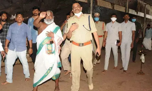 Superintendent of Police Dr Fakkeerappa Kaginelli inspecting the functioning of CC cameras at lower and upper Ahobilam temple in Allagadda on Friday