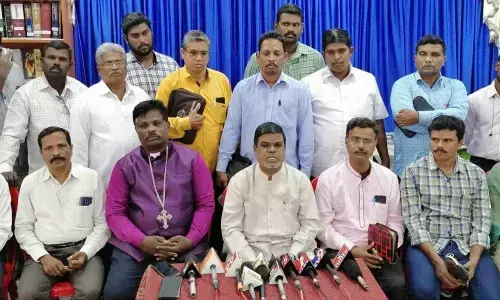 TUCC honorary president Pastor Arul Arasu addressing a meeting in Tirupati on Friday