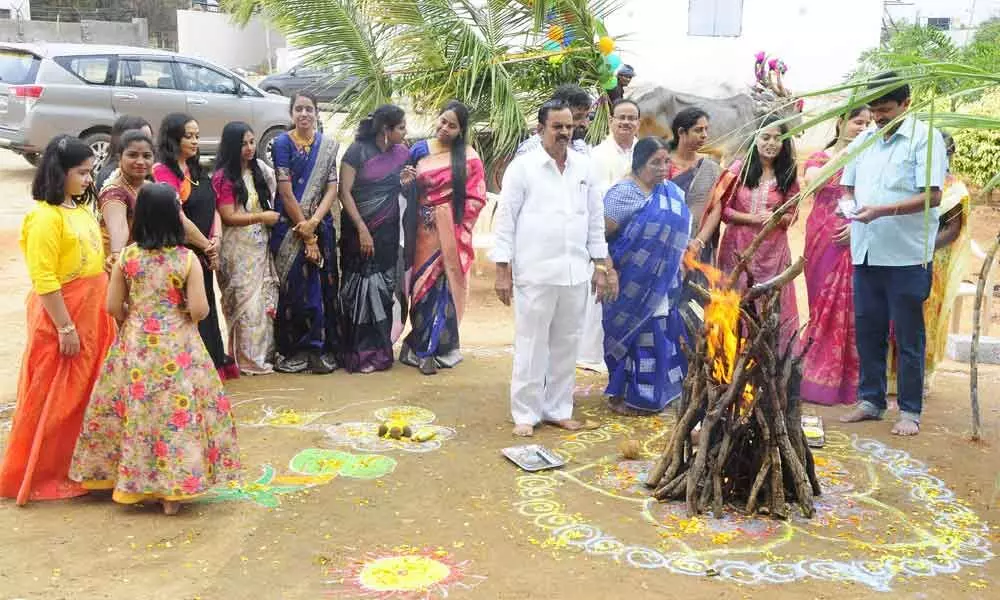 Students and faculty members celebrating pre-Sankranti celebrations at Anantha Lakshmi International School in Anantapur
