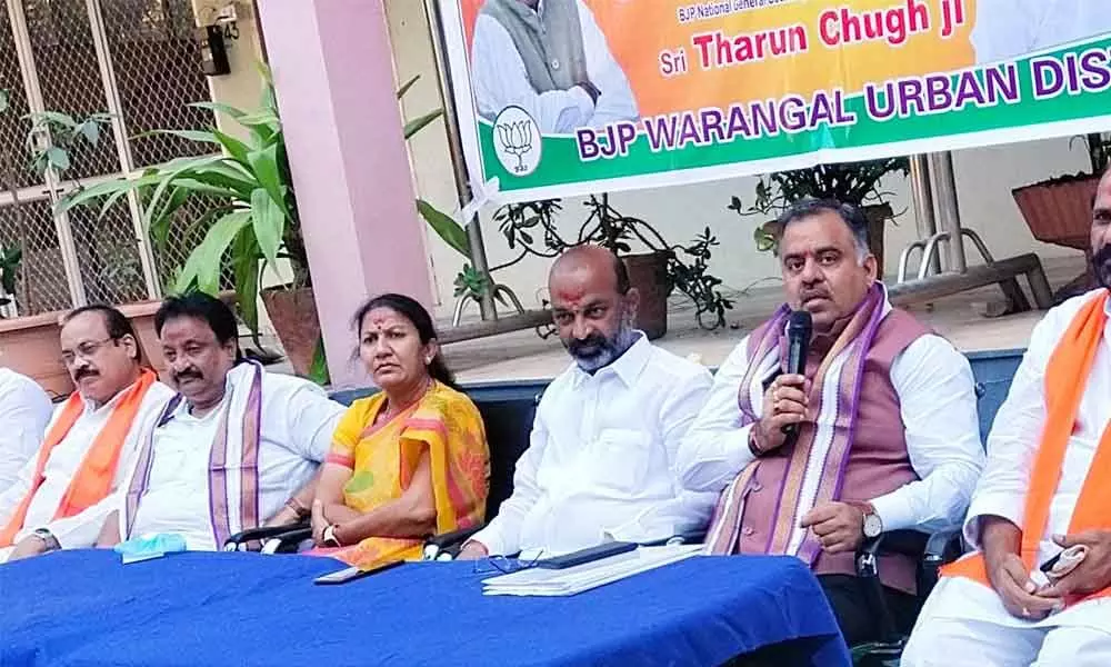 BJP national general secretary and Telangana in-charge Tarun Chugh speaking to media persons in Warangal