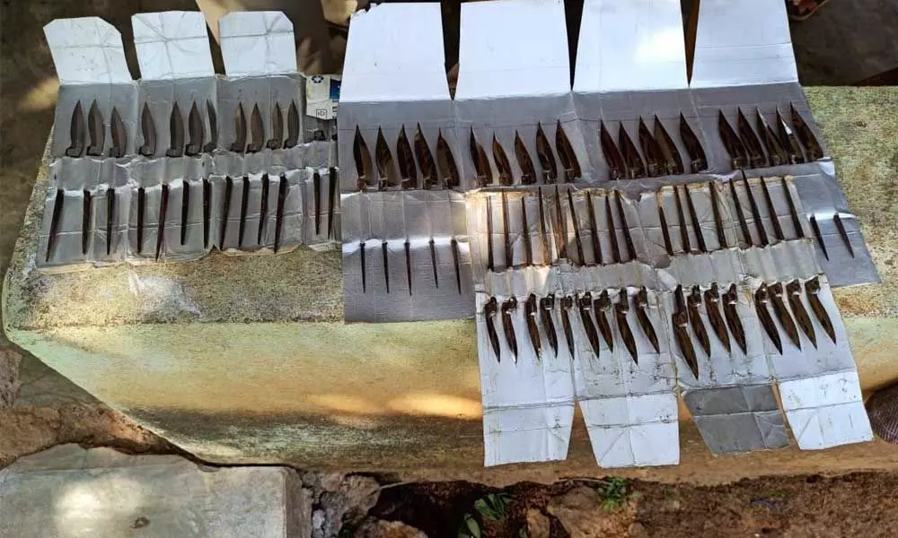 Knives prepared for supply in cockfights being seized in Gogulampadu village