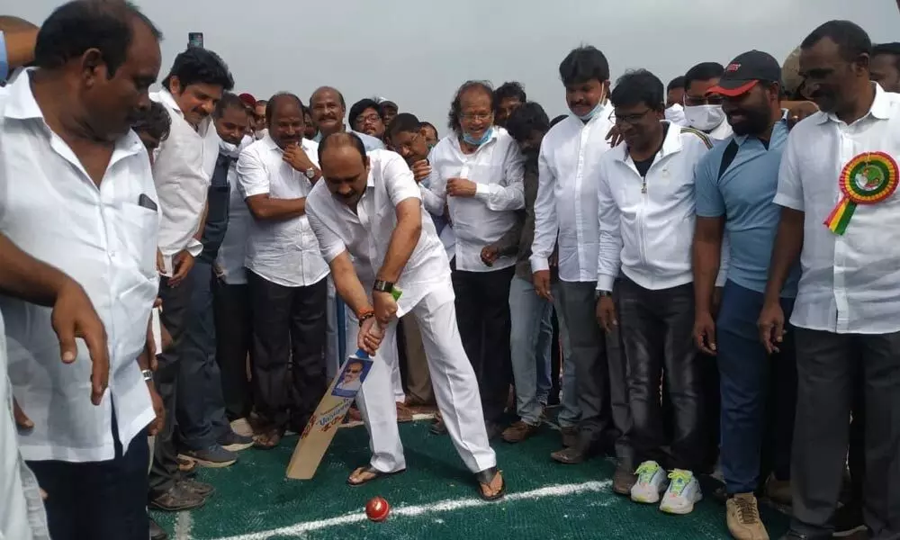 Minister Balineni Srinivasa Reddy inaugurating the cricket tournament  in Ongole on Sunday