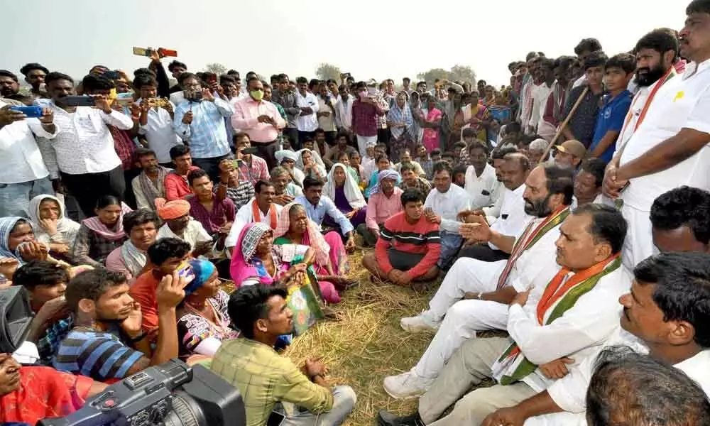 TPCC chief and Nalgonda MP Uttam Kumar Reddy interacting with the tribals during his visit to Mattamaplly mandal on Sunday