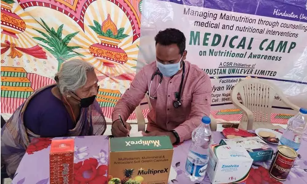 Doctor interacting with a patient at a medical camp in Rajamahendravaram  on Monday