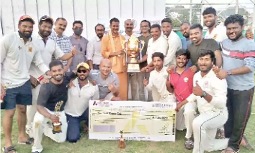 The DMCC Ongole team, winner of Chittithoti Jayakumar Memorial Tournament, posing with the cash prize cheque and trophy on Monday