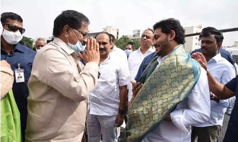 MP Adala Prabhakar Reddy requesting the Chief Minister Y S Jagan Mohan Reddy for outer ring road at the helipad in Nellore on Monday