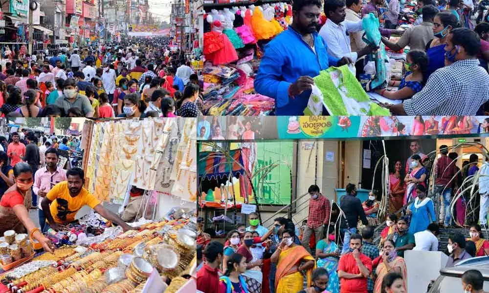 Peoples buying clothes and jewellery items at Beasant road to mark of Sankranti festival in Vijayawada on Tuesday
