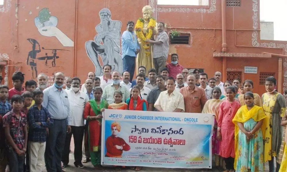 JCI Club members paying tributes to Swami Vivekananda in Ongole on Tuesday