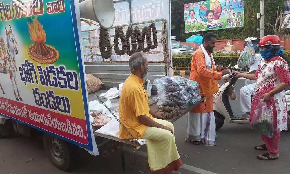 Cow dung patties are getting sold like hot cakes at a mobile selling point in Visakhapatnam