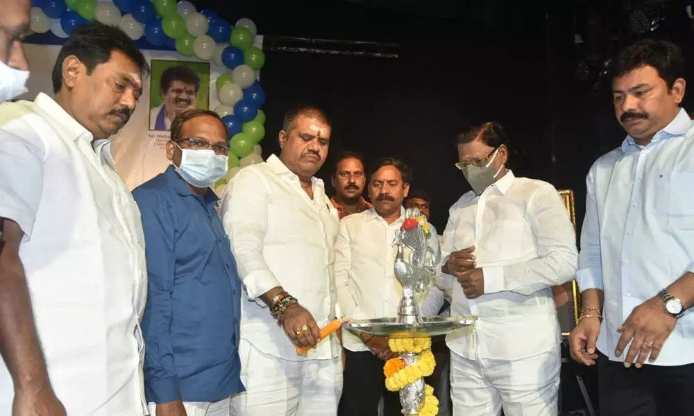 Tourism Minister M Srinivasa Rao and others taking part in Swami Vivekananda’s birth anniversary celebrations in Visakhapatnam on Tuesday