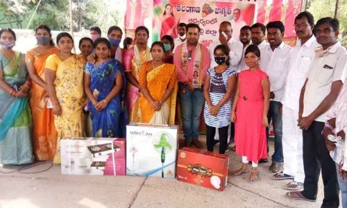 Women, who won prizes in rangoli competitions held by Telangana Jagruthi district unit in Sultanabad on Tuesday