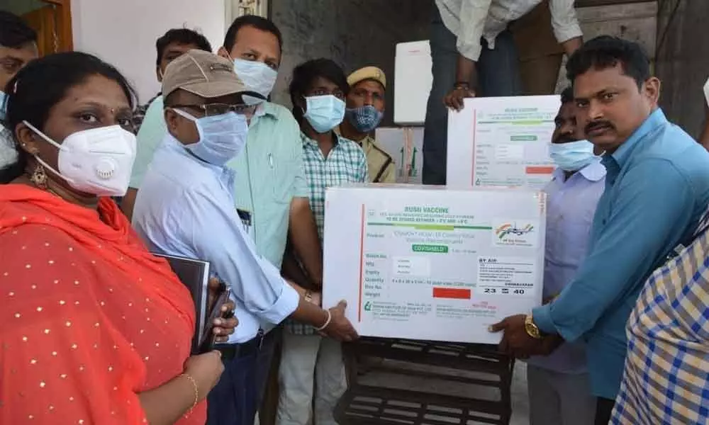 District Medical and Health Officer Dr Rama Giddaiah and District Immunisation Officer Dr Visveshwara Reddy receiving Covid vaccine in Kurnool on Wednesday
