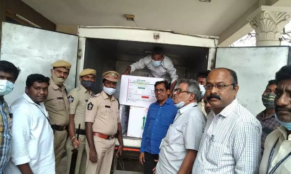 District Immunisation Officer Dr C Hanumantha Rao receiving the Covishield vaccine at district vaccine store in Chittoor on Wednesday