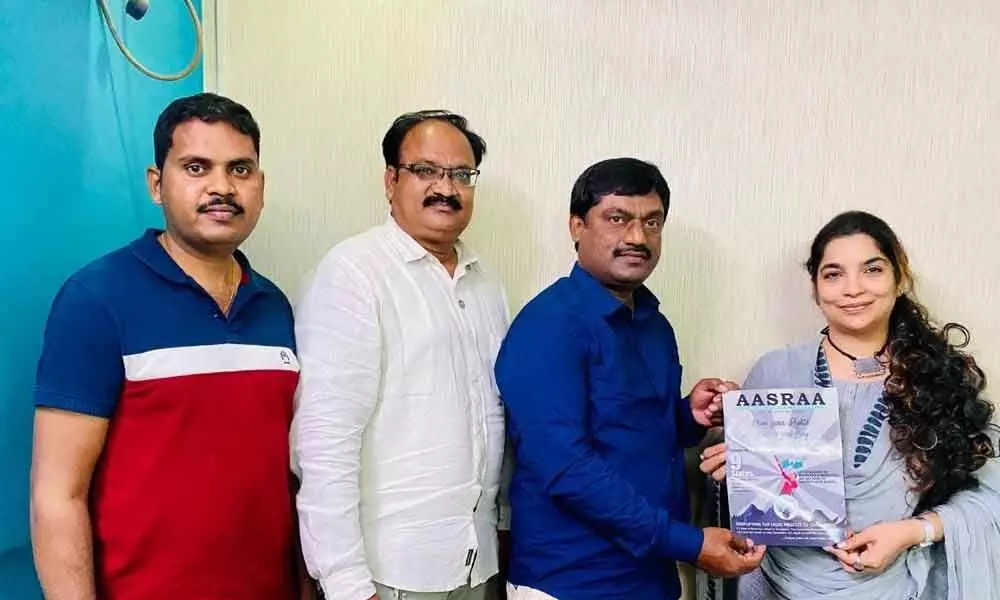 AP High Court advocate Habib Sultan Ali handing over appointment order as AP womens wing president of AASRAA to Karambir Kaur in Vijayawada on Friday