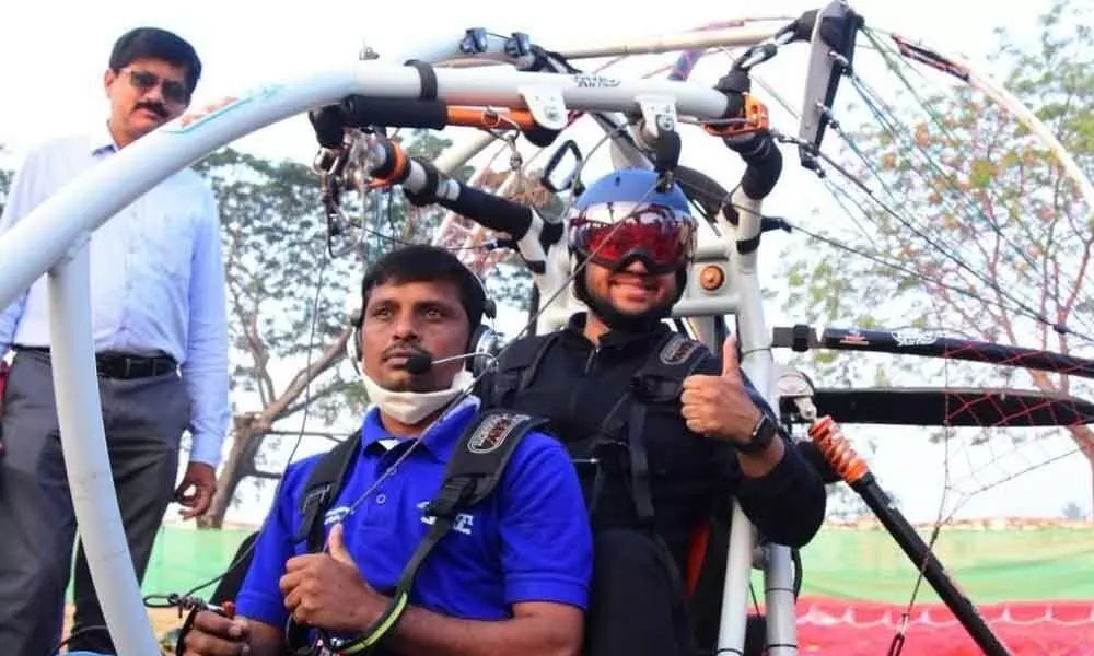 Additional Collector Tejas Nandalal Pawar getting ready for the Joy ride during National Paramotoring Championship and Air Show in Mahbubnagar