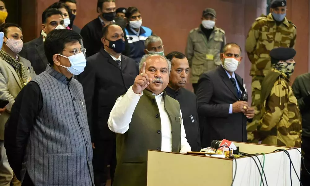 Union Minister for Agriculture and Farmers Welfare Narendra Singh Tomar along with Minister for Commerce and Industry Piyush Goyal and Minister of State Som Prakash addresses the media after the ninth round of talks with farmers’ leaders on Saturday