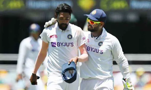 Sundar, Siraj abused by Gabba crowd, called grub