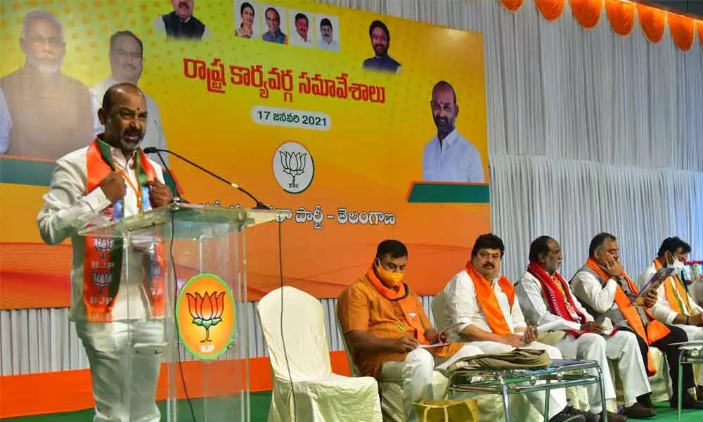 Telangana State BJP chief Bandi Sanjay Kumar delivering the presidential address at the first State executive meeting