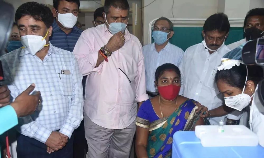 Tourism Minister M Srinivasa Rao visits VIMS to monitor vaccination drive in Visakhapatnam on Sunday.