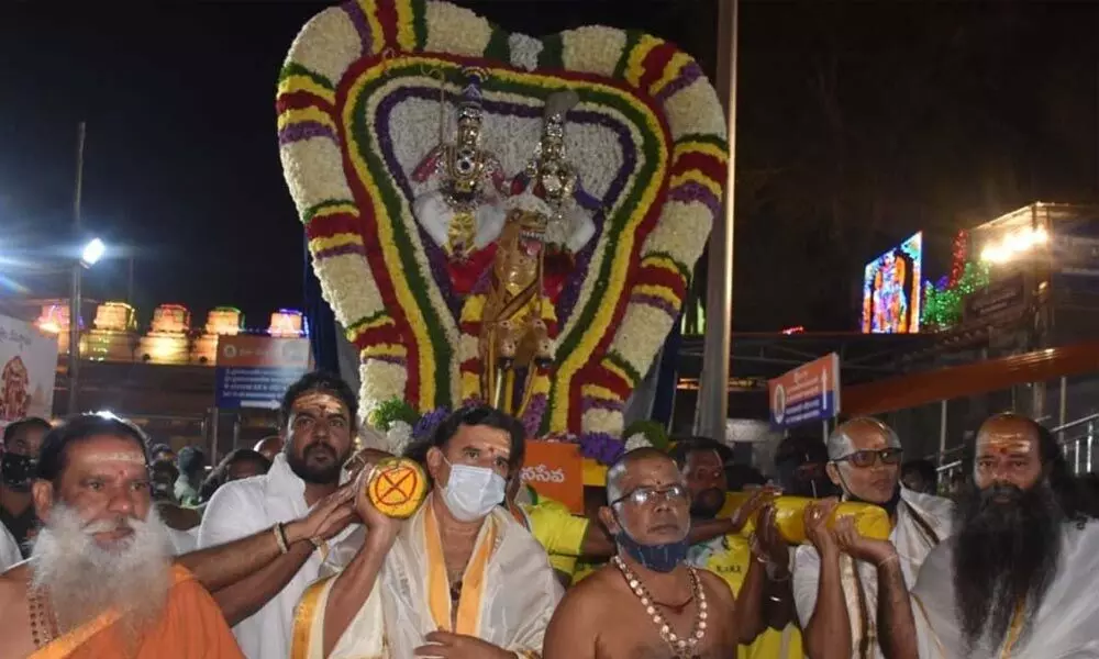 God and Goddess taken out in a procession on Aswa Vahana on the last day of week-long Sankranti Brahmotsvams at Srisailam temple on Sunday