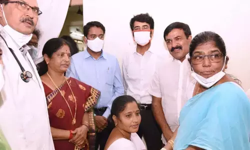A health worker being administered vaccine in Kakinada