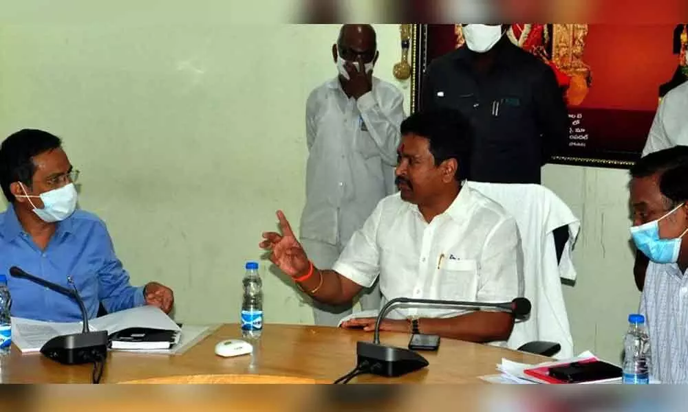 Endowments Minister V Srinivasa Rao holding a review on Ramatheertham temple and other issues with officials of the department in Vijayawada on Monday
