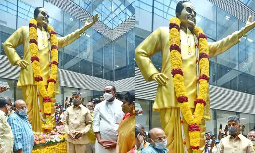TDP chief N Chandrababu Naidu and other leader pay tributes to NTR at party office in Mangalagiri on Monday