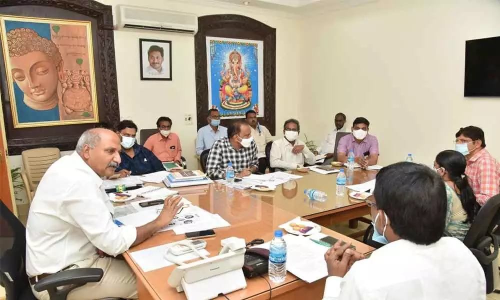 District Revenue Officer C Chandrasekhara Reddy addressing a meeting in Guntur on Monday