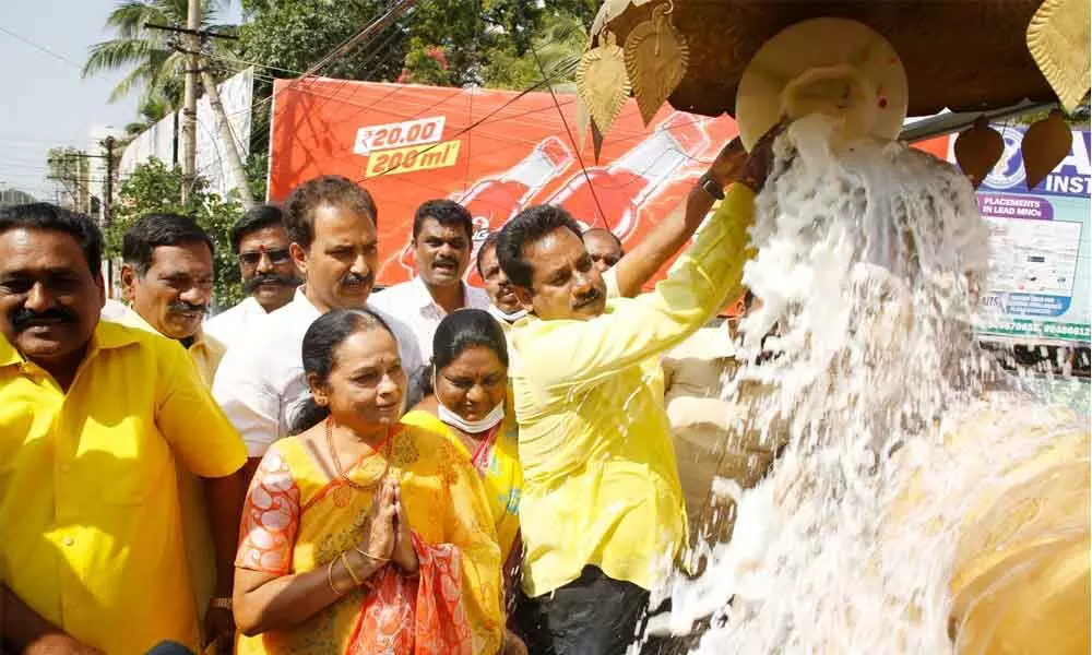 TDP leaders M Suguna, Sreedhar Varma, Narasimha Yadav and others performing ‘Palabhishekam’ to the statue of NT Rama Rao in Tirupati on Monday.