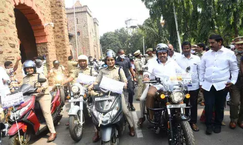 Tourism Minister M Srinivasa Rao taking part in a bike rally organised as a part of the National Road Safety Month at the Collectorate in Visakhapatnam on Monday