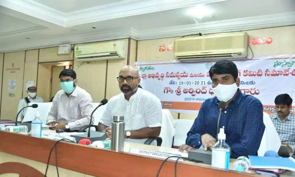 MP Dharmapuri Arvind and District Collector C Narayana Reddy at DISHA meeting at Pragati Bhavan conference hall at Nizamabad Collectorate on Tuesday