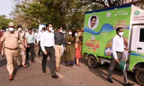 East Godavari Collector D Muralidhar Reddy inspecting door-to-door ration delivery vehicles at District Sport Authority Complex in Kakinada on Tuesday