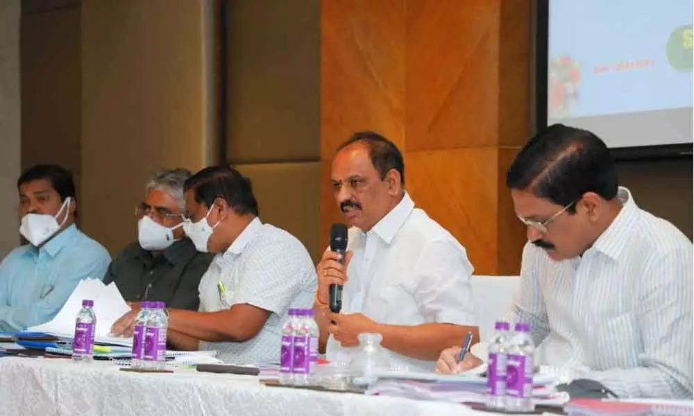 Minister for Road and Buildings M Sankara Narayana speaking at the review meeting in Visakhapatnam on Wednesday
