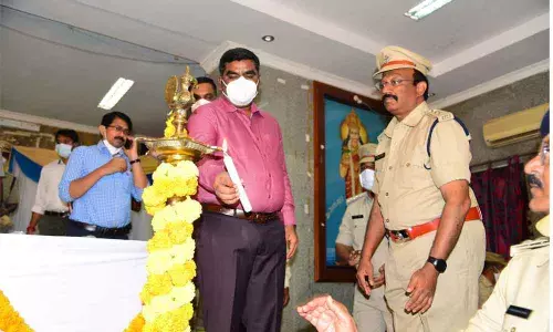 District Collector G Veera Pandiyan lighting the lamp to mark the inauguration of 32nd National Road Safety Month celebrations at Zilla Parishad Conference in Kurnool