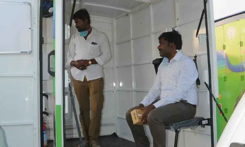 District Collector Gandham Chandrudu inspecting the mini-goods vehicles kept for launch at the Government Arts College premises in Anantapur