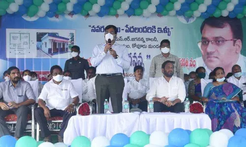 District Collector K V N Chakradhar Babu addressing a meet in Kovur on Wednesday. MLA N Prasanna Kumar Reddy is also seen.