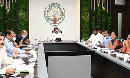 Chief Minister Y S Jagan Mohan Reddy holding a review meeting on YSR Jagananna Saswatha Bhoomi Hakku-Bhoomi Rakshana scheme at his camp office