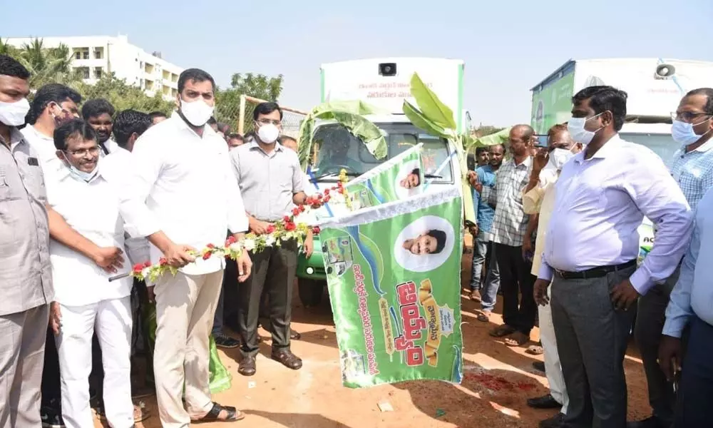 Minister Dr P Anil Kumar Yadav launching the ration distribution vehicles at ACSR stadium in Nellore on Thursday