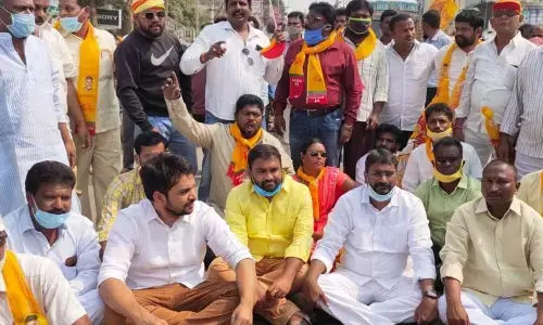 TDP leaders staging agitation condemning arrest of Kala Venkata Rao in Rajam town on Thursday