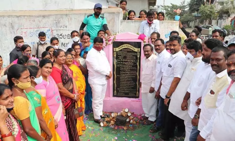 Mayor Gunda Prakash Rao laying foundation stone for a development work in 23rd division in Warangal on Friday
