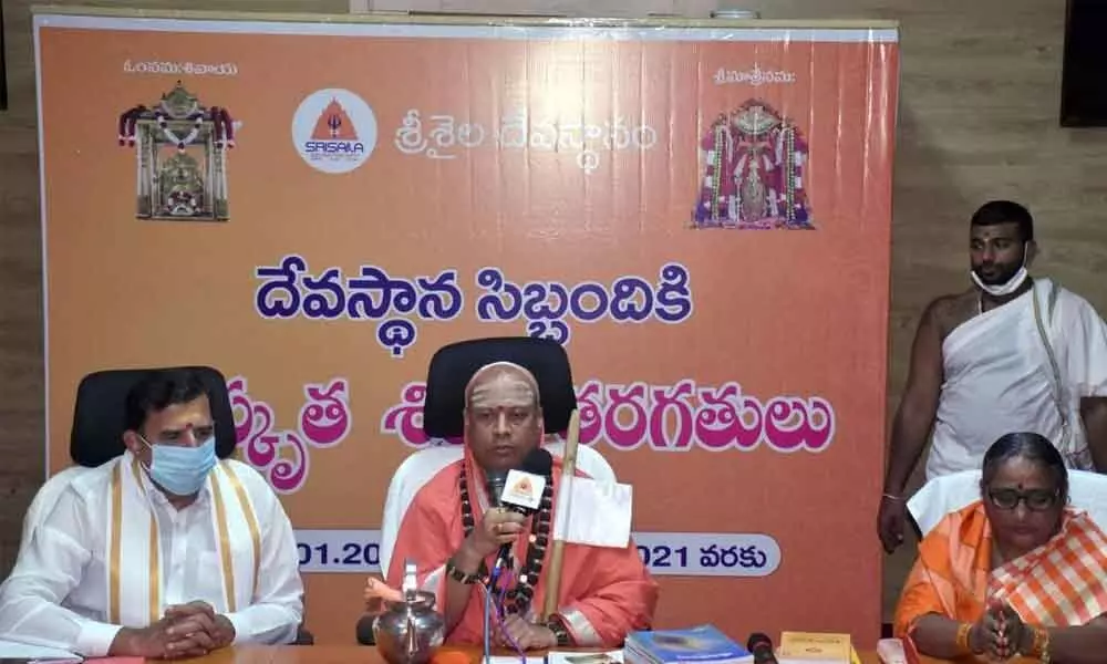 Jagadguru Shivacharya Maha Swamy Ji speaking on the importance of Sanskrit language at Srisailam temple on Friday. Temple Executive Officer KS Rama Rao also seen.