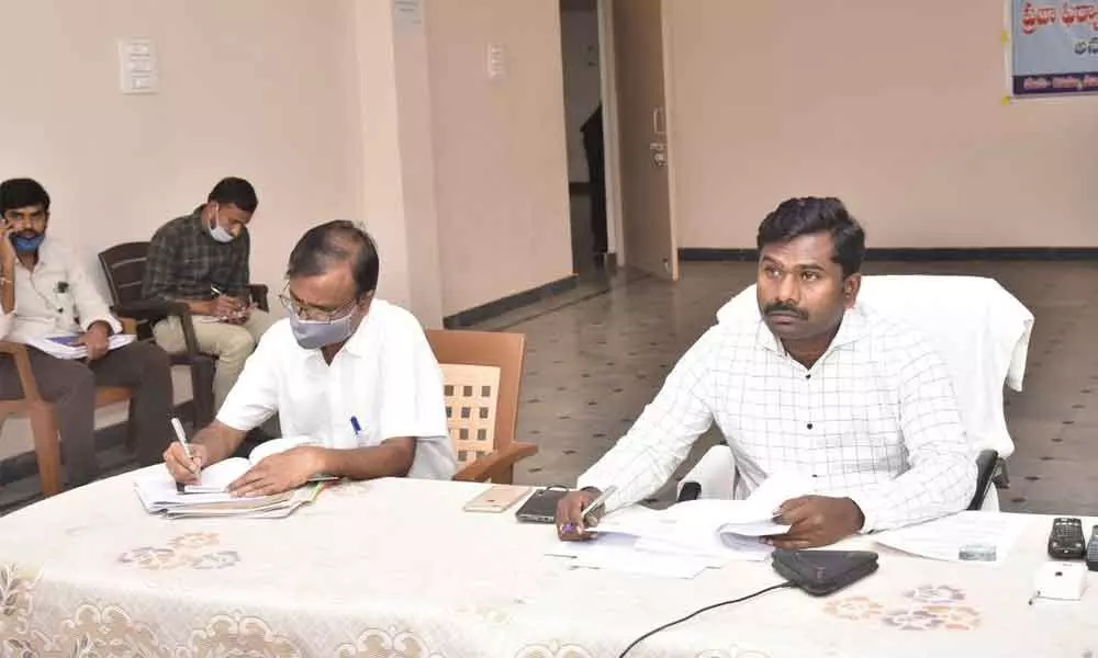 Collector Gandham Chandrudu participating in video-conference with Chief Electoral Officer Vijayanand from Kalyanadurgam Tahsildhar office on Friday