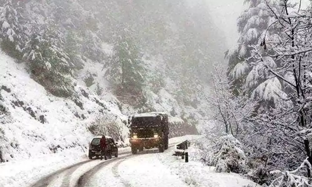 Snow in valley, rain in Jammu