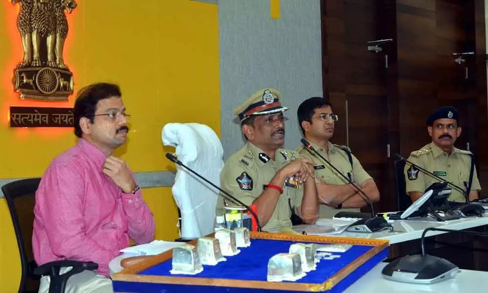 Commissioner of Police B Srinivasulu giving details of arrest of the accused in Durga temple silver lions theft case in Vijayawada on Saturday.