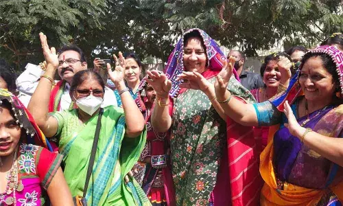 Minister for Tribal Welfare Satyavathi Rathod dancing with Banjaras at Warangal Press Club on Sunday